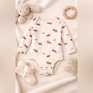 Adorable Cream Animal Print Baby Onesie